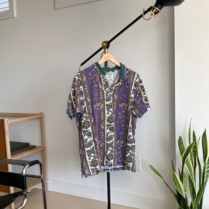 Urban outfitters 90s style coogi allover print polo shirt.